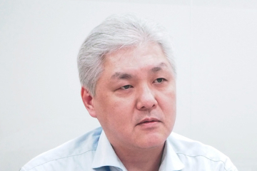 経営戦略統括部 飯田 康範 氏
